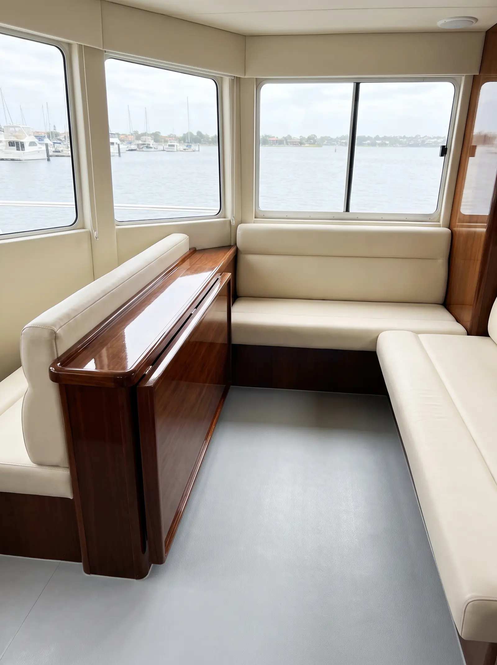 Spotless detailed boat cabin interior with clean upholstery and polished timber in O'Connor