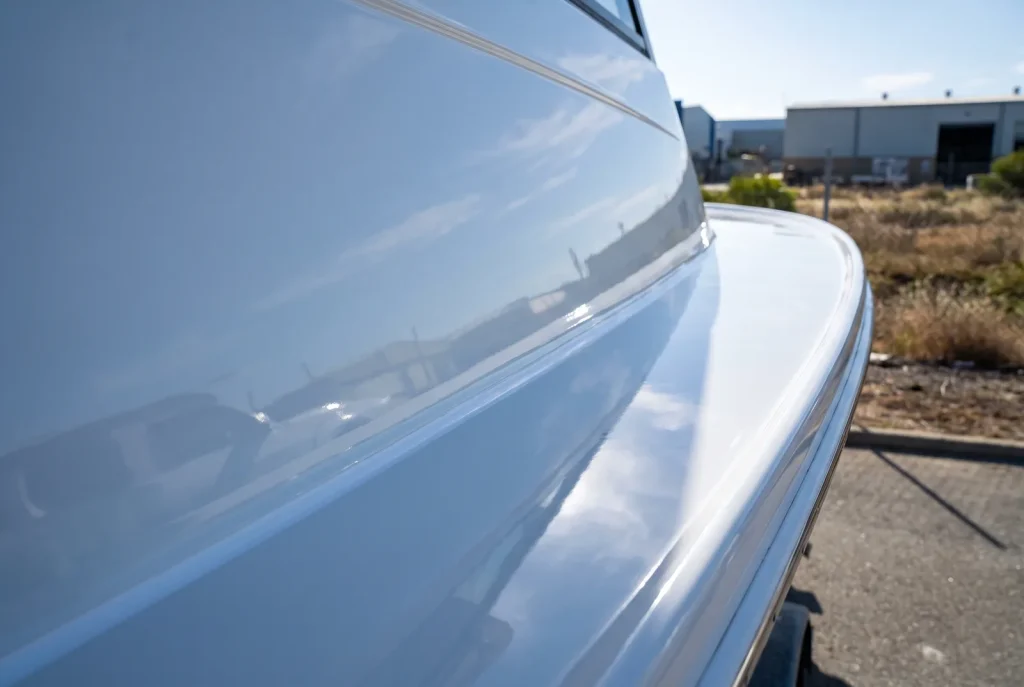 Oxidation removal edge and seam detail on glossy boat hull, boat detailing in O'Connor WA